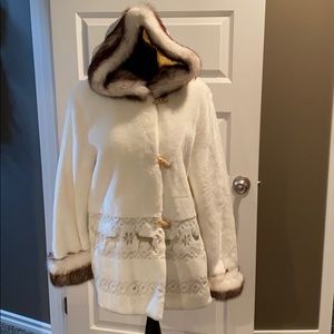 White faux fur coat